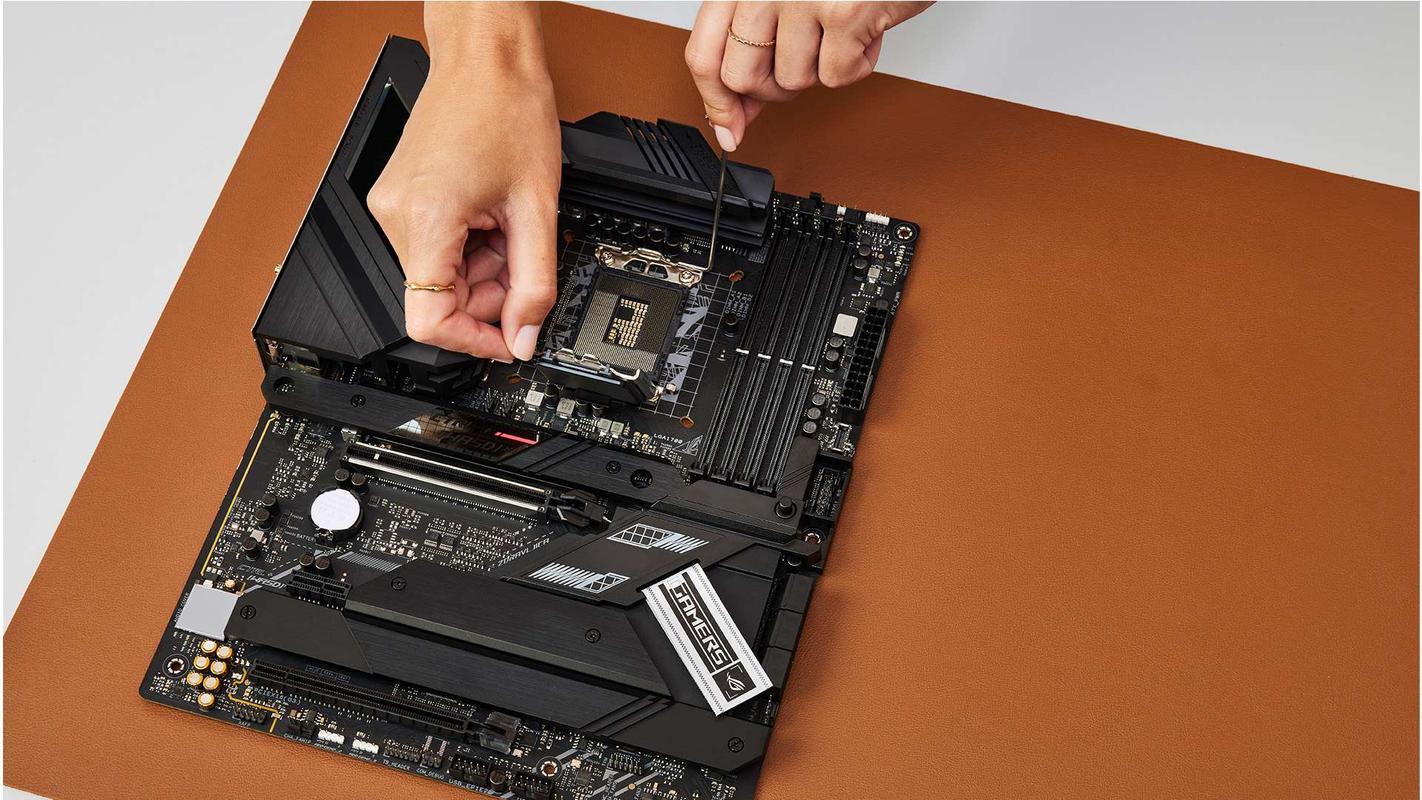 主板上面cpu的塑料盖子怎么上